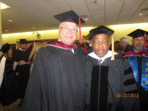 Jimmy Easter, USW with Representative John Lewis, honorary degree recipient at the 2013 NLC Commencement